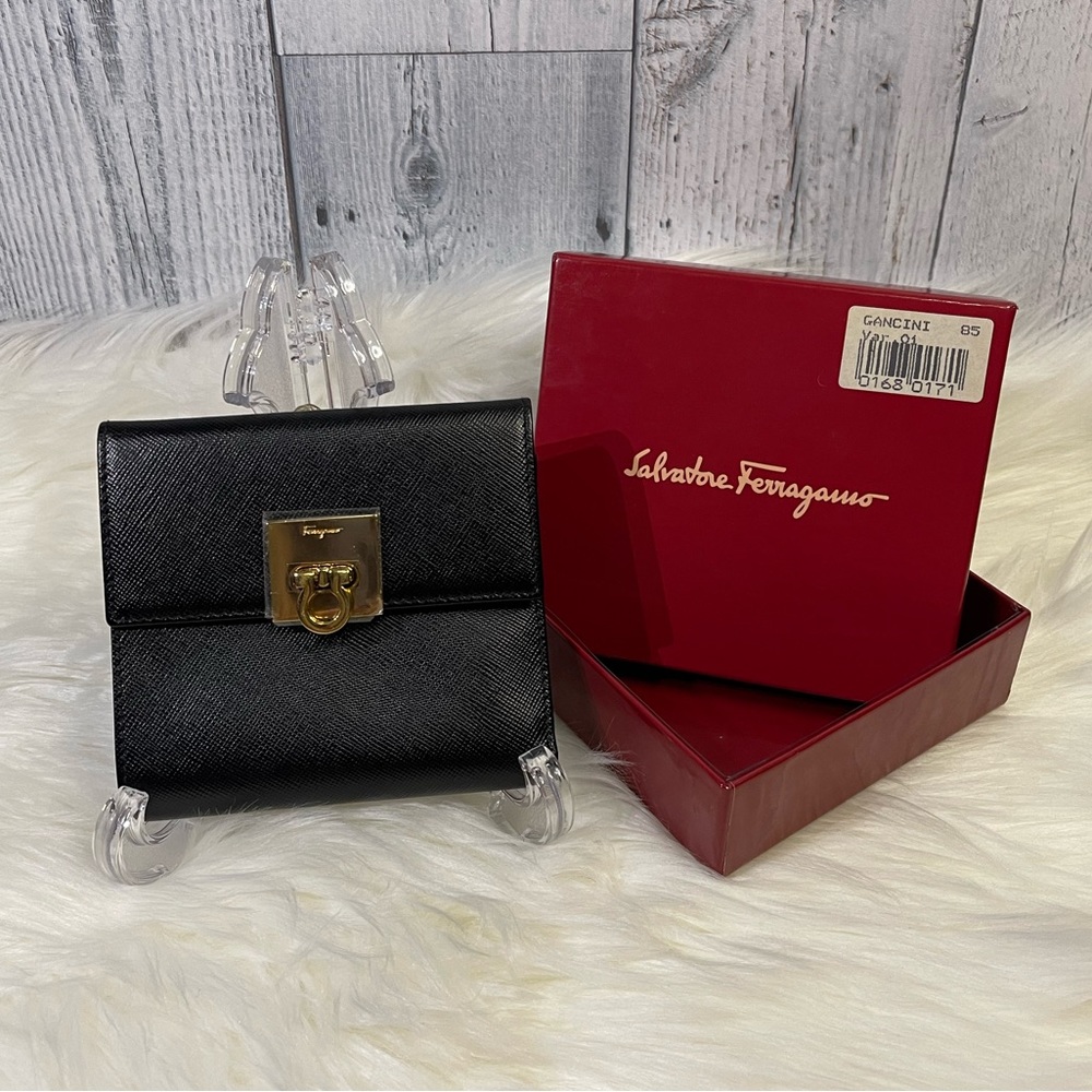 SALVATORE FERRAGAMO gancini compact wallet in black with ghw